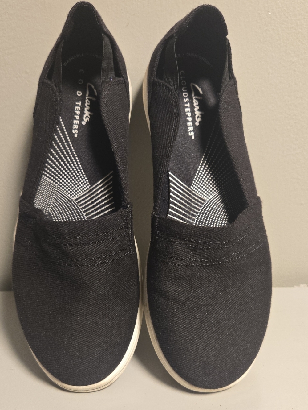 Clarks Black Slip-On Canvas Sneakers with White Soles